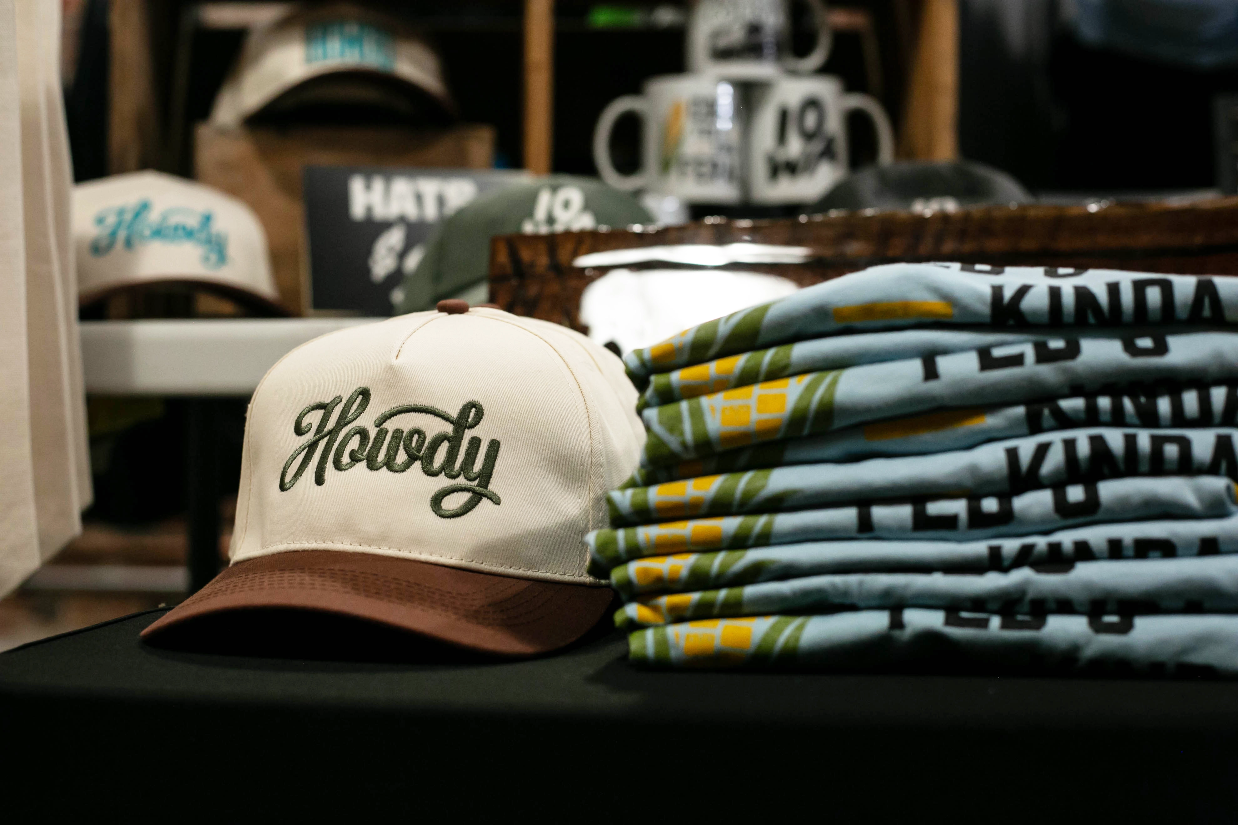 Custom embroidered Howdy hat on display