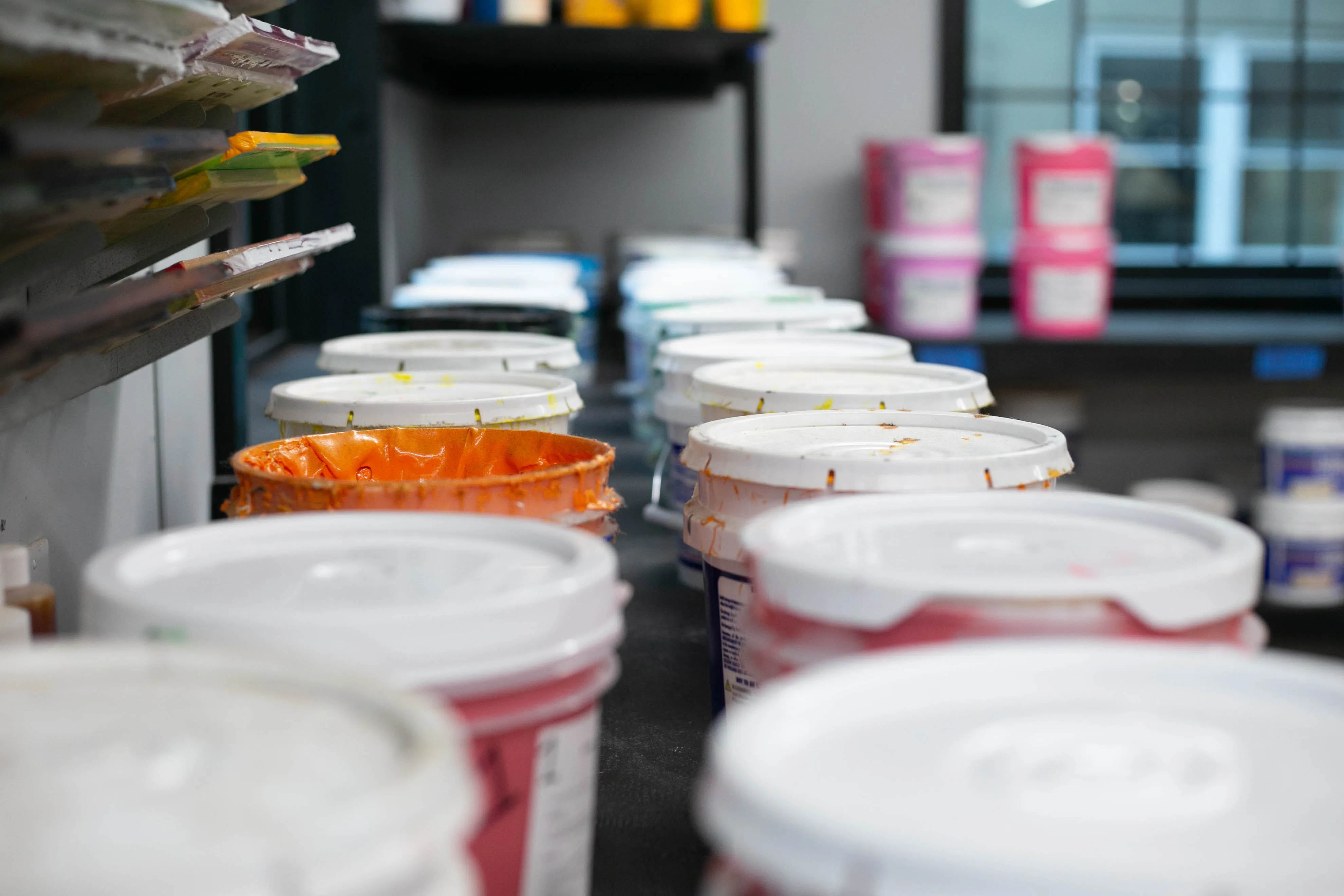 Rows of screen printing ink ready for production